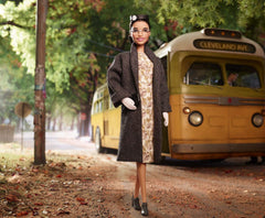 Barbie Rosa Parks with glasses and gloves for educational display.