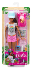Barbie brunette hiking doll with cap and sneakers for outdoor exploration and play.