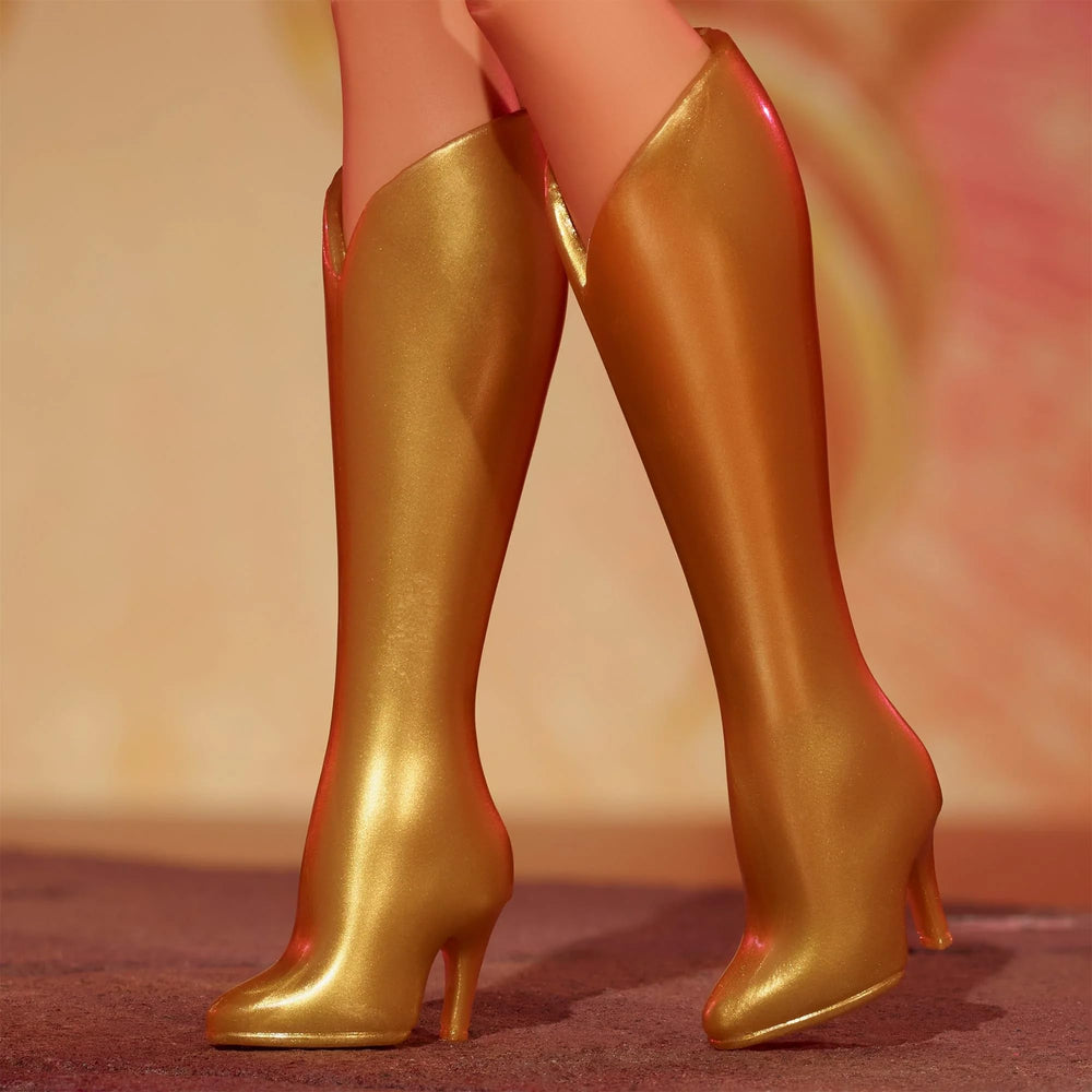 Barbie She-Ra winged headpiece close-up highlights collectible design.