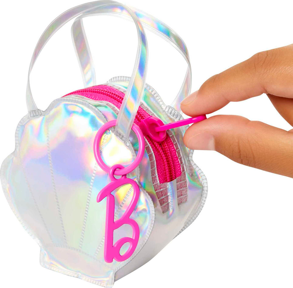 Barbie shell-shaped purse with clip adds portable storage to playtime