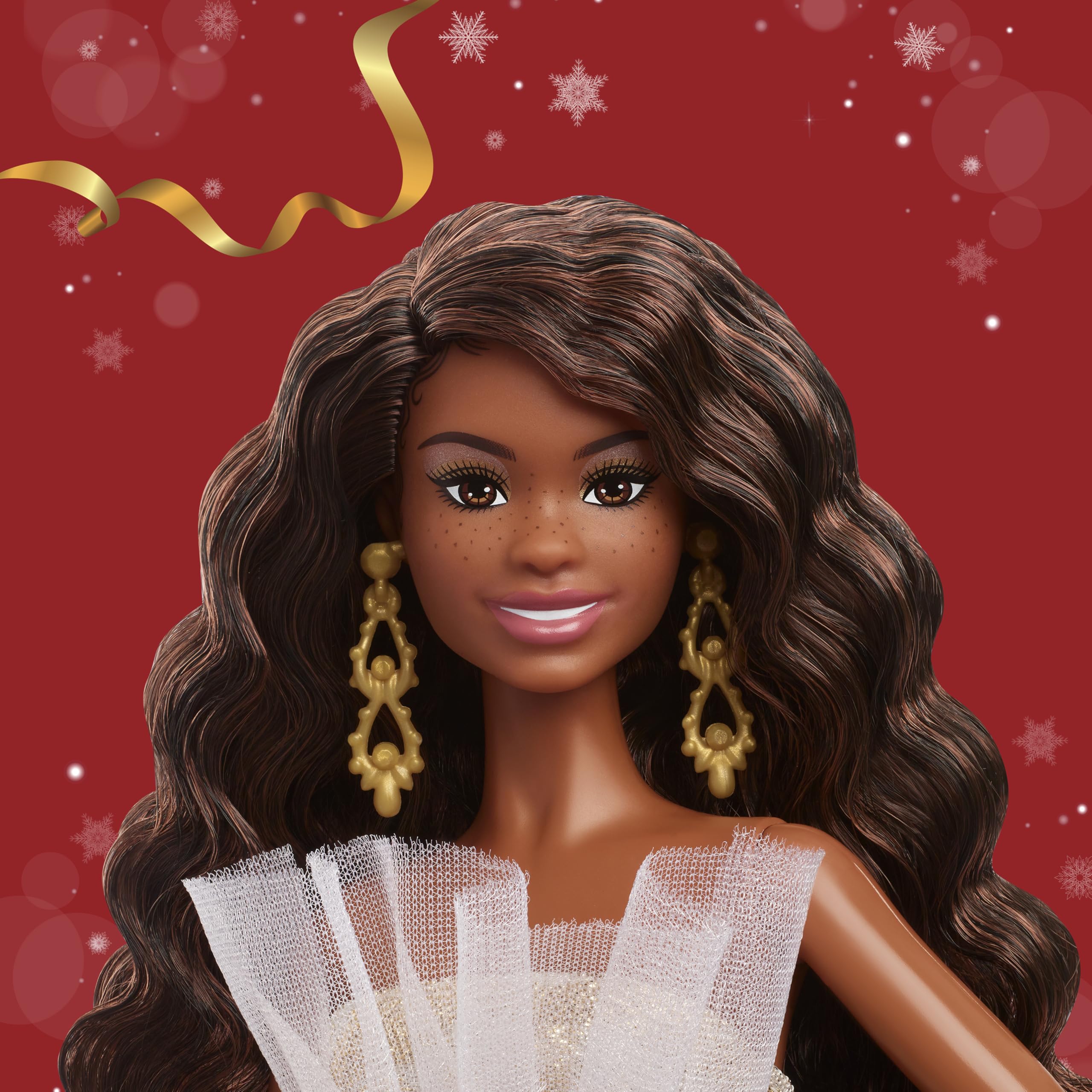 Barbie Signature 2025 Holiday doll with black hair and strapless gown, perfect for collectors.