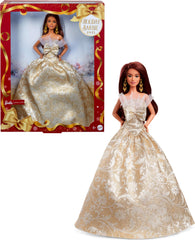Barbie Signature 2025 Holiday doll in silver gown displayed in packaging for festive display.