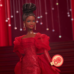 Barbie Signature Doll with drop earrings featuring golden M for vintage charm.