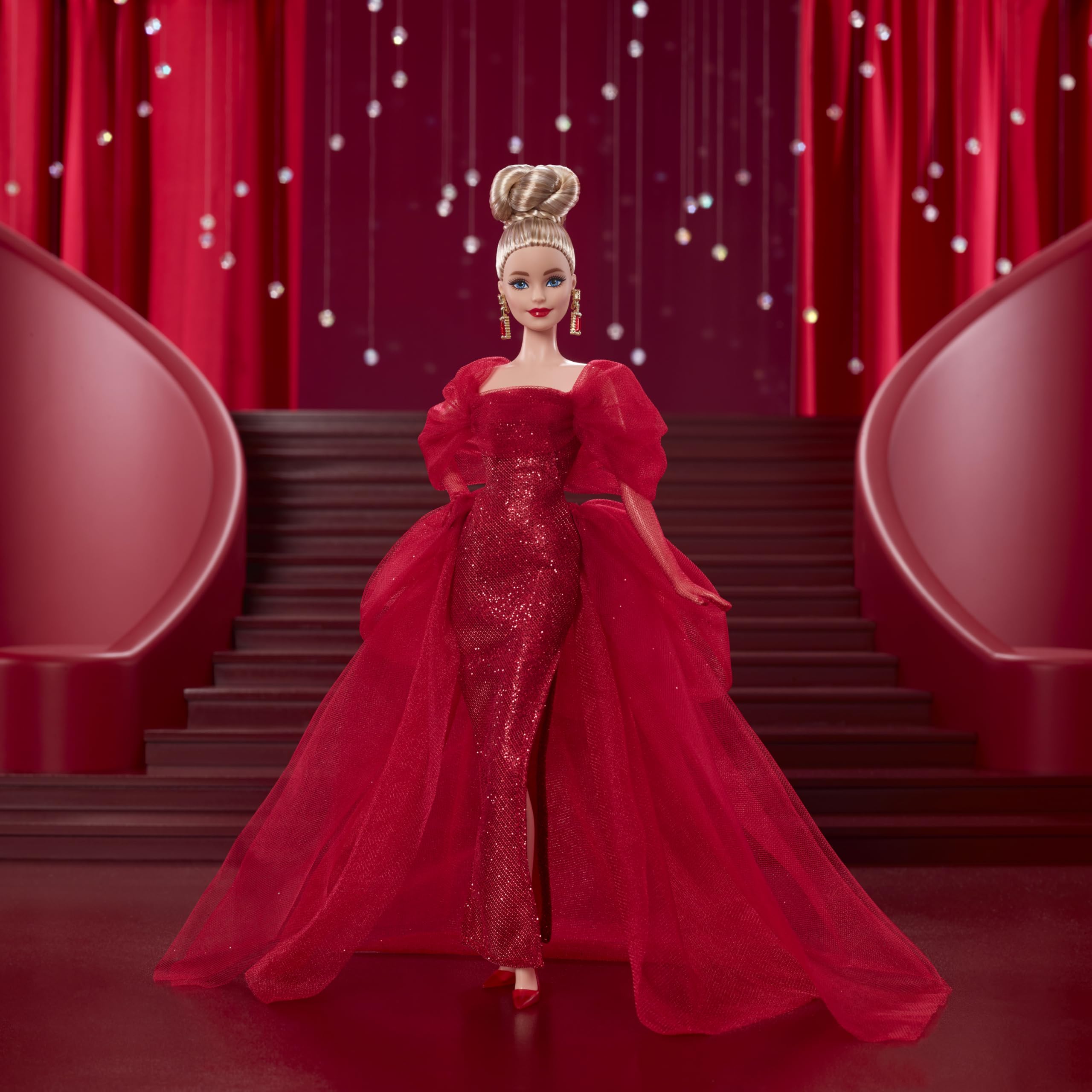 Barbie Signature 80th anniversary look with red carpet gown enhances display in shelves.