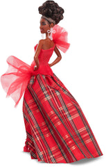 Barbie Signature doll with bold red lips and golden nails for photos