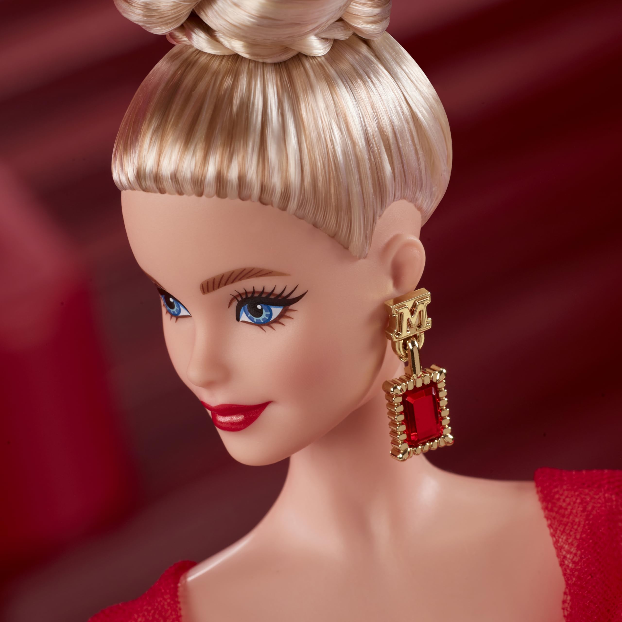 Barbie Signature doll wears sheer gloves and black nails for dramatic elegance.