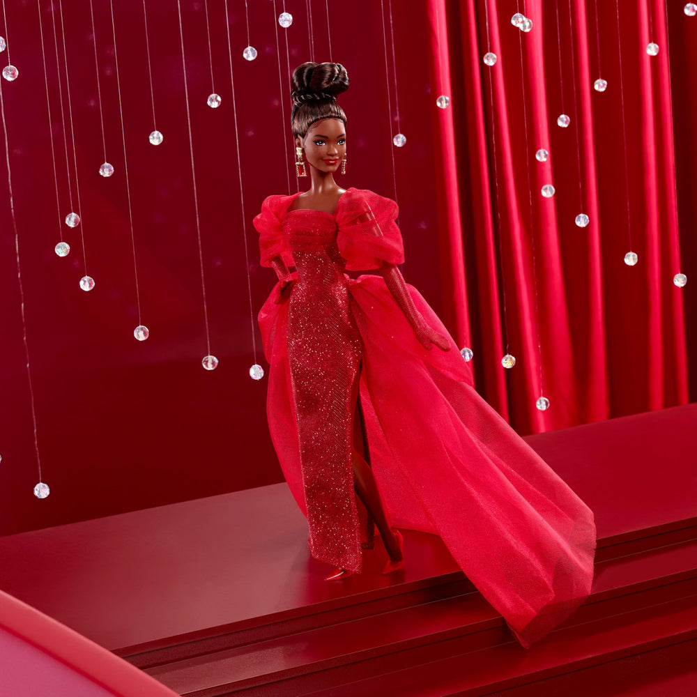 Barbie Signature Doll highlights tulle sleeves, bustle, and train for dramatic presentation.