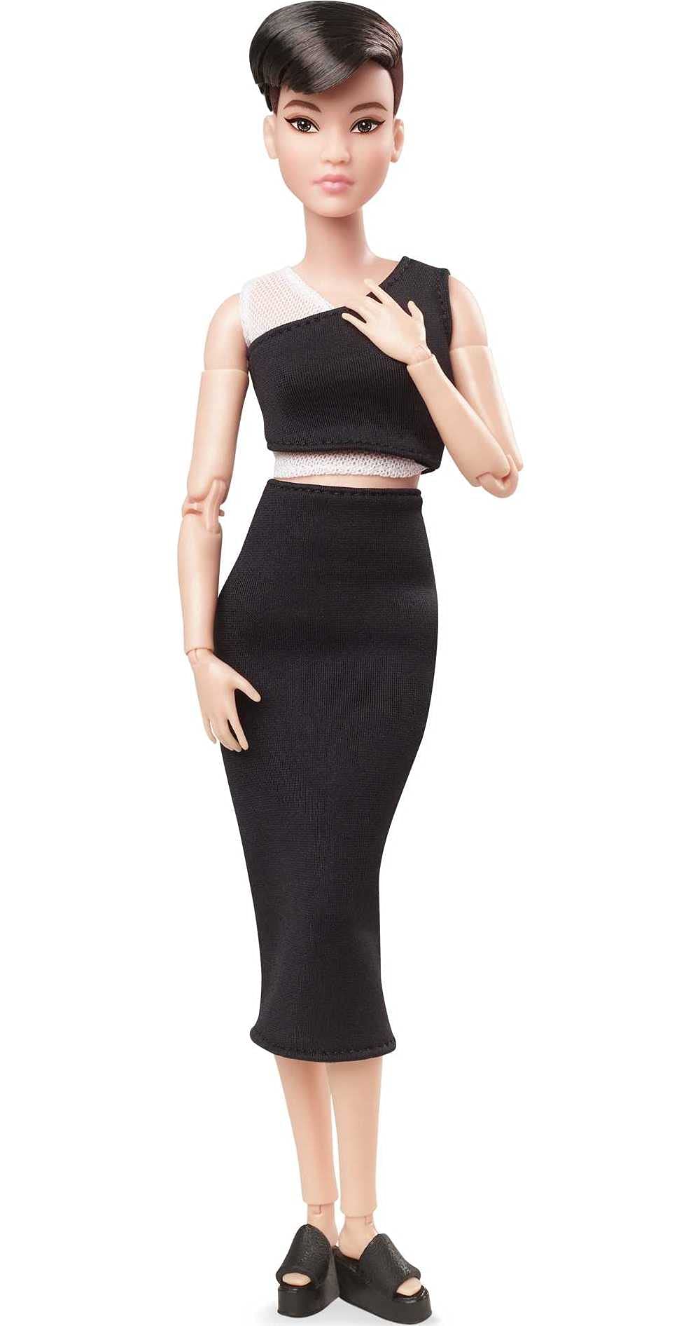 Barbie Signature Looks doll's articulated body enables dynamic posing for photos.