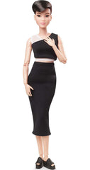 Barbie Signature Looks doll's articulated body enables dynamic posing for photos.