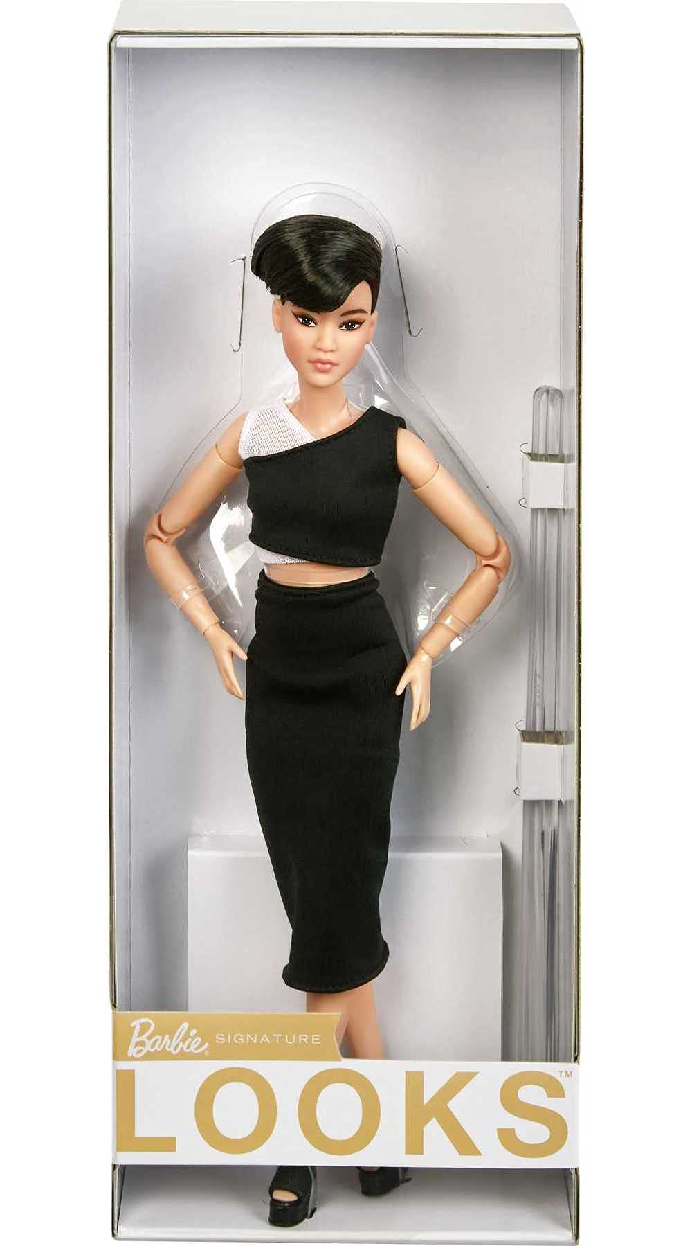 Barbie Signature Looks doll includes stand and authenticity certificate for display and gifting.