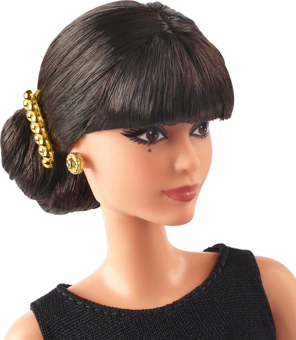 Barbie Rita Moreno doll black gold gown detail for collector display.