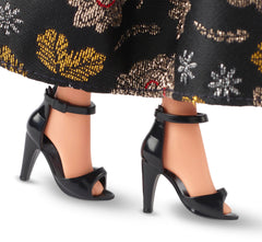Barbie Rita Moreno doll classic heels complete her iconic red carpet look.