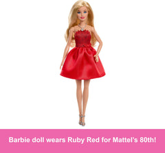 Barbie's silvery heeled sandals completing the festive red ensemble.