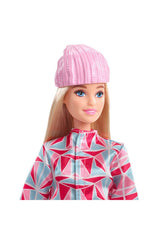 Barbie snowboarder doll in helmet ready for action-packed snowy adventures.