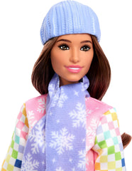 Barbie Careers Snowboarder doll in pink boots for slide-ready styling.