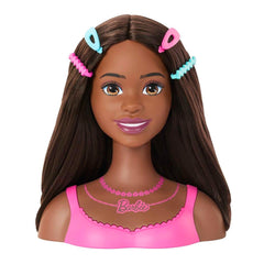 Barbie Styling Head featuring flower barrettes for playful looks.