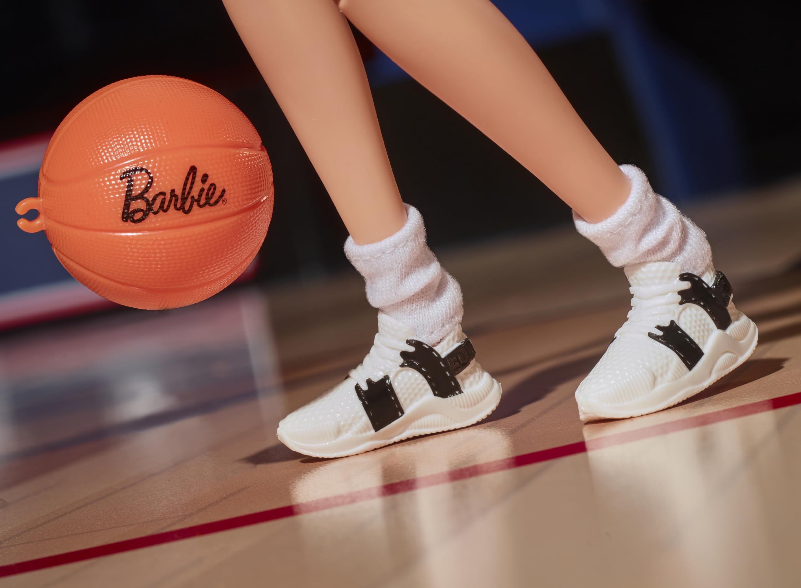 Barbie Sue Bird doll with sleek ponytail showing classic court-ready look.