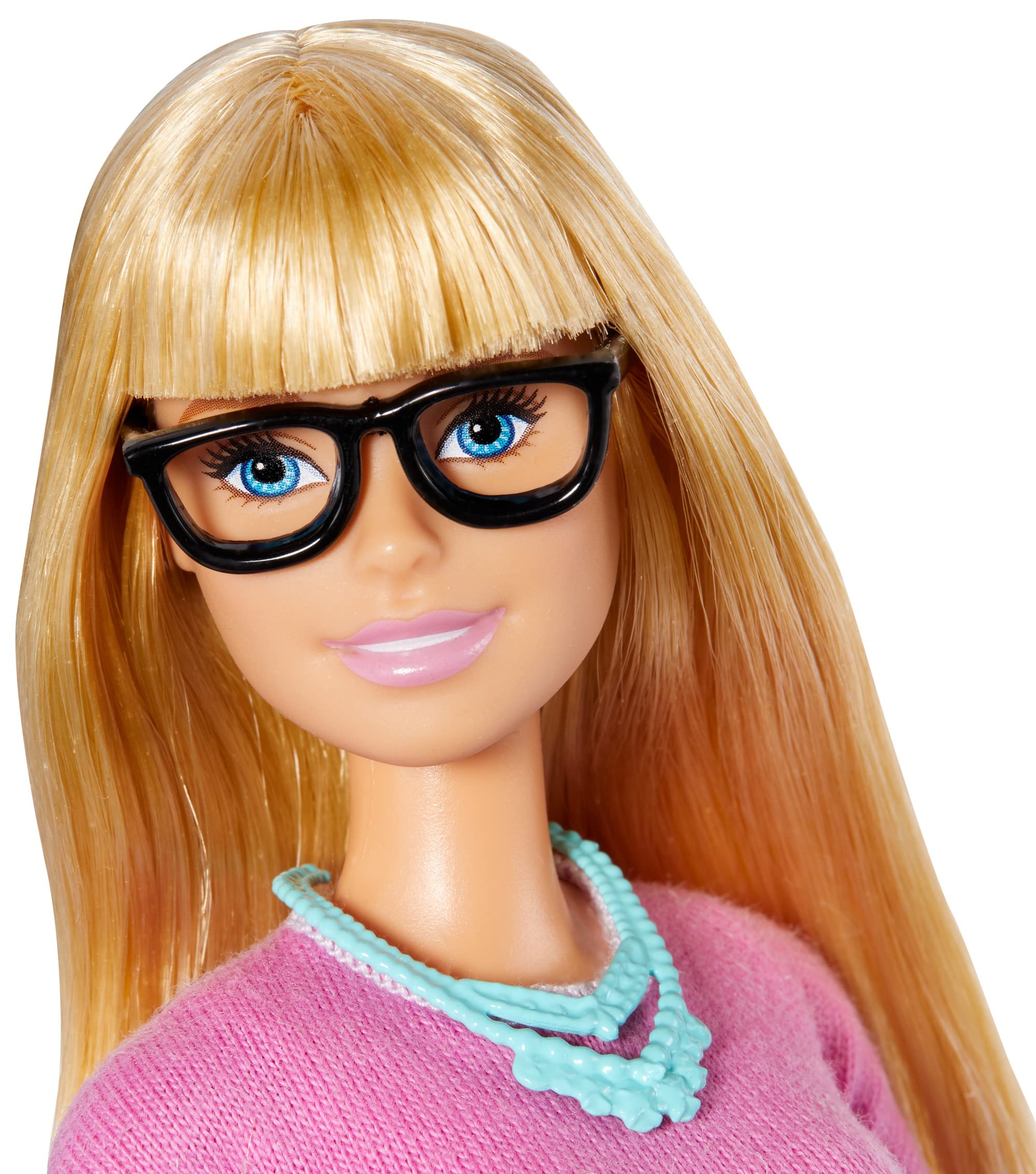 Barbie Teacher Doll outfit closeup showcases bright colors and inviting classroom presence.