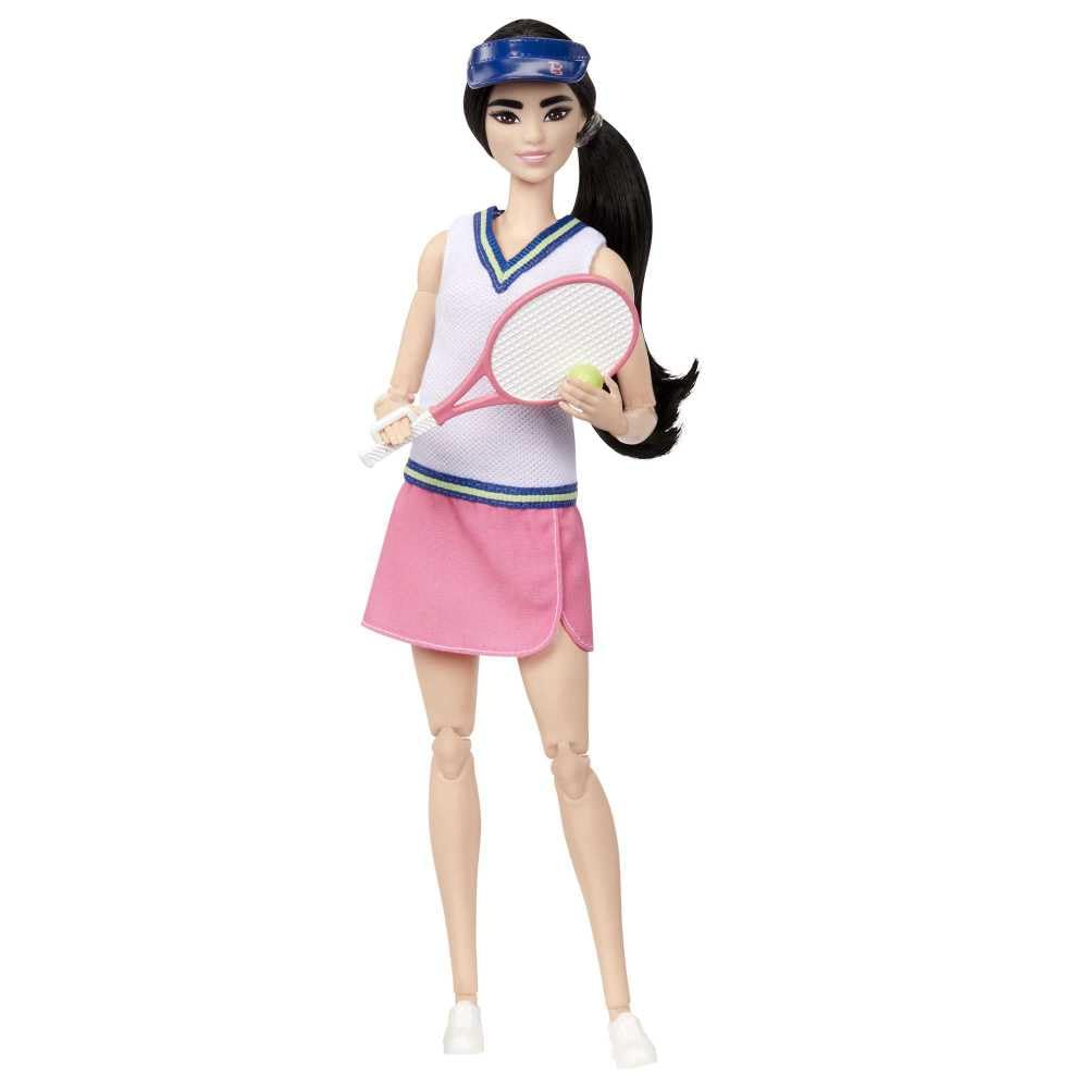 Barbie tennis racket and ball accessories for active play.