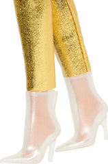 Barbie Glyph's long blonde waves enhance party-ready styling.