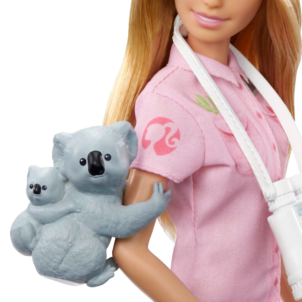 Barbie zoologist baby figure supports caregiving storytelling