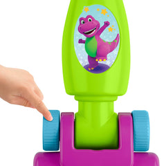 Barney's World Clean Up Vacuum in use promotes gross motor movement and imagination.