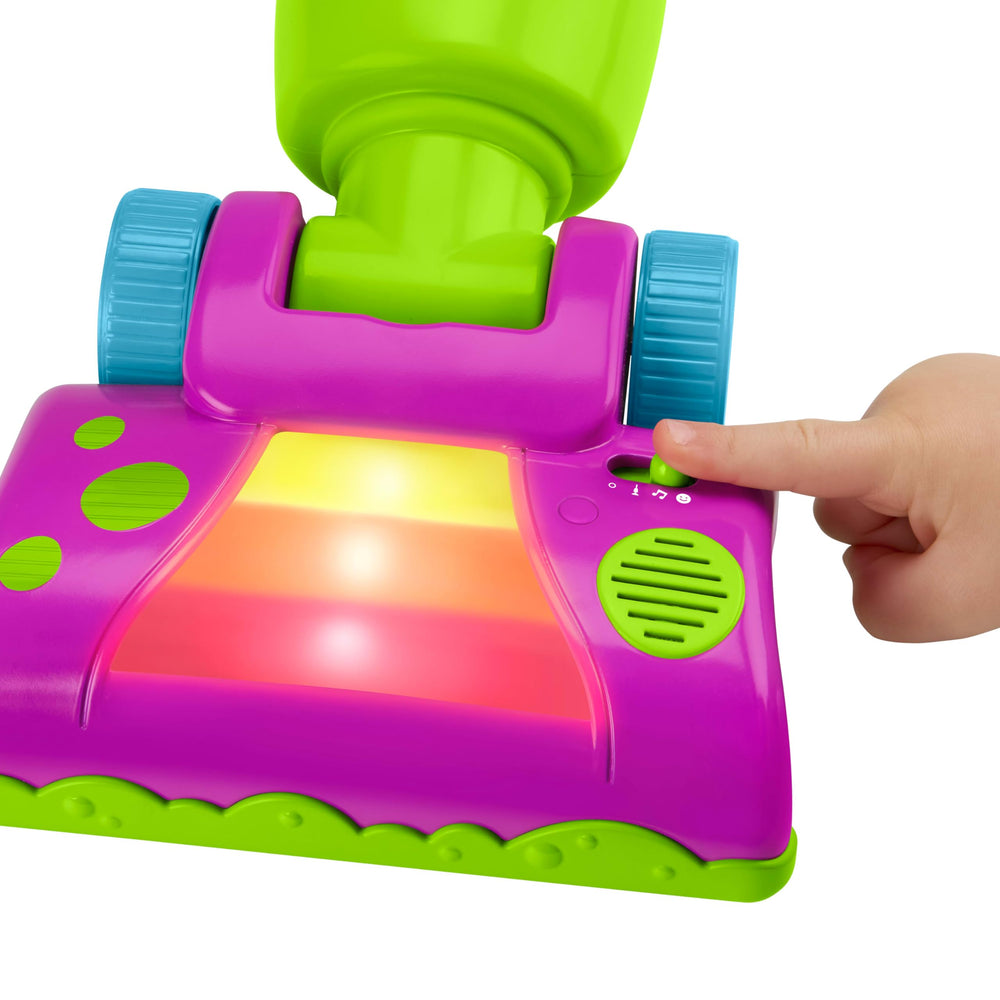 Barney's World Clean Up Vacuum lights illuminate during push-along play for sensory fun.