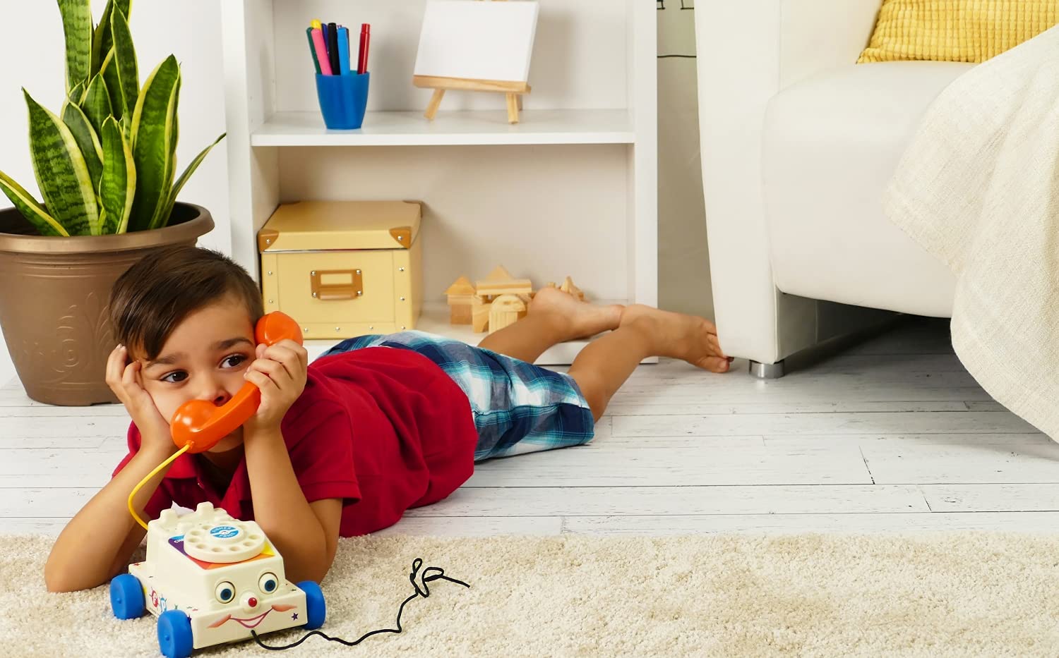 Basic Fun Fisher-Price Chatter Phone rotary dial rings for realistic pretend calls.