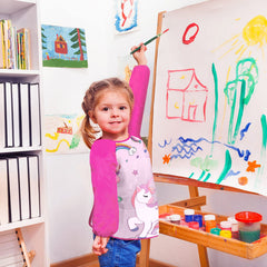 Bassion Kids Art Smock pink with three roomy pockets for art supplies.