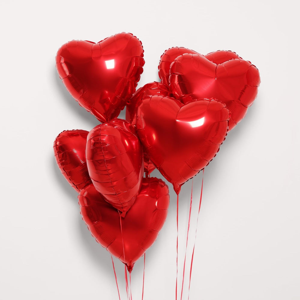 BBPOOL champagne gold heart balloon closeup showing metallic finish.
