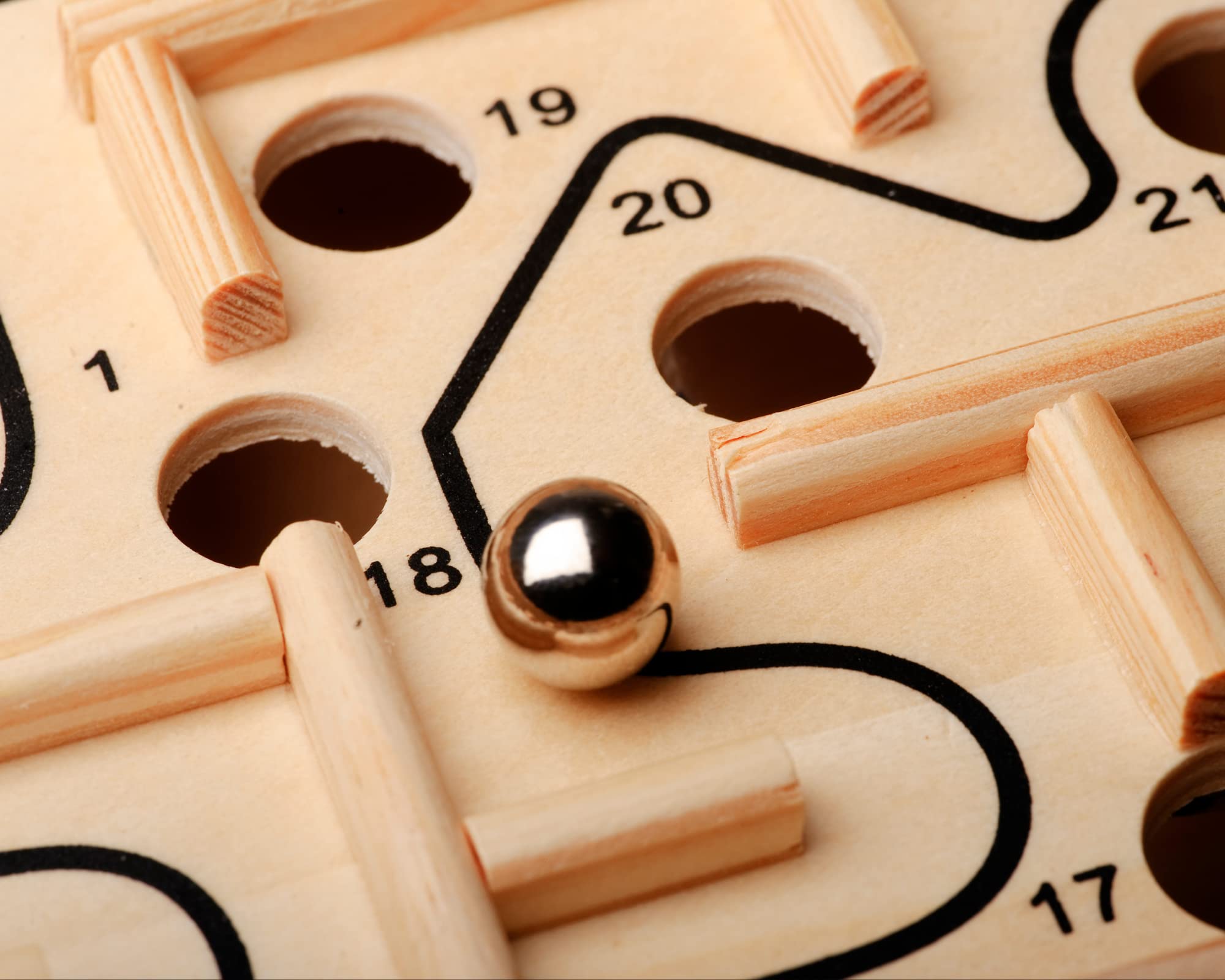 BC Precision ball in a wooden maze demonstrates reliable fit and play