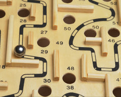 BC Precision wooden labyrinth game scene showing a steel ball navigating a maze