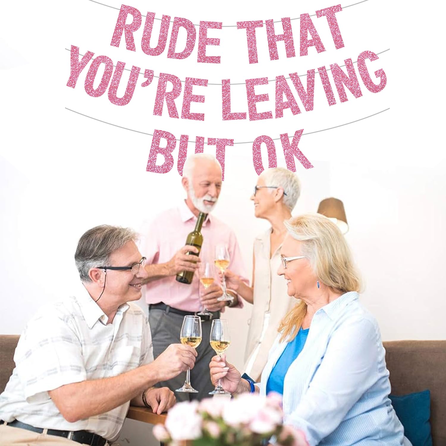 BEISHIDA Pink Rude banner serves as a photo backdrop for farewell parties