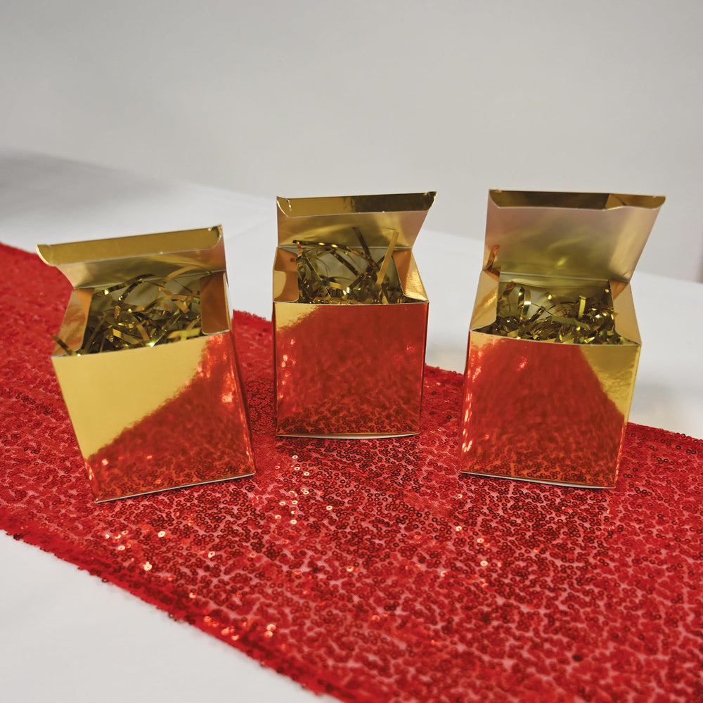 Beistle Gleam 'N Shreds gold strands on table creating elegant decor accents
