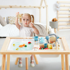Beright kids enjoying cooperative role-play at a sensory kitchen setup.