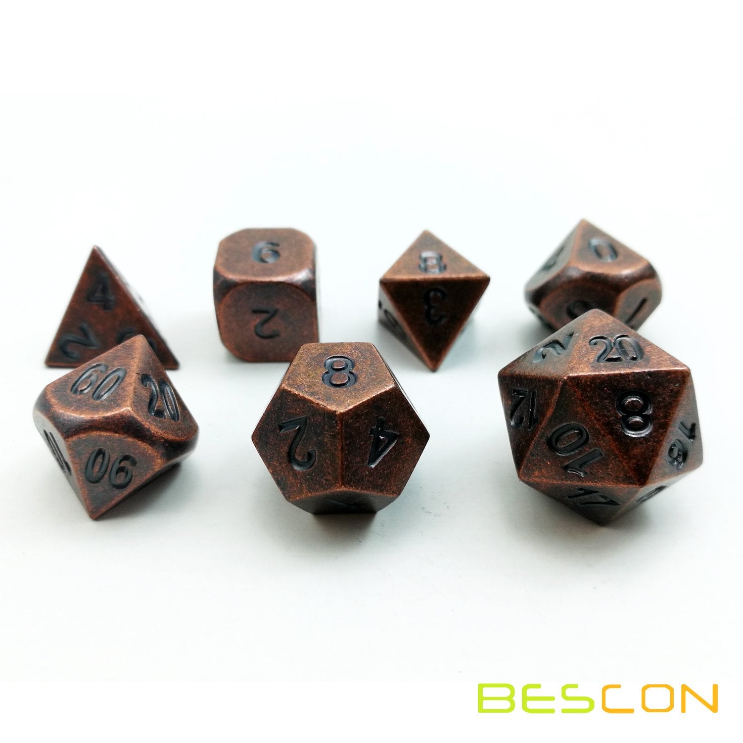 Bescon antique copper dice on a gaming table during an RPG night.
