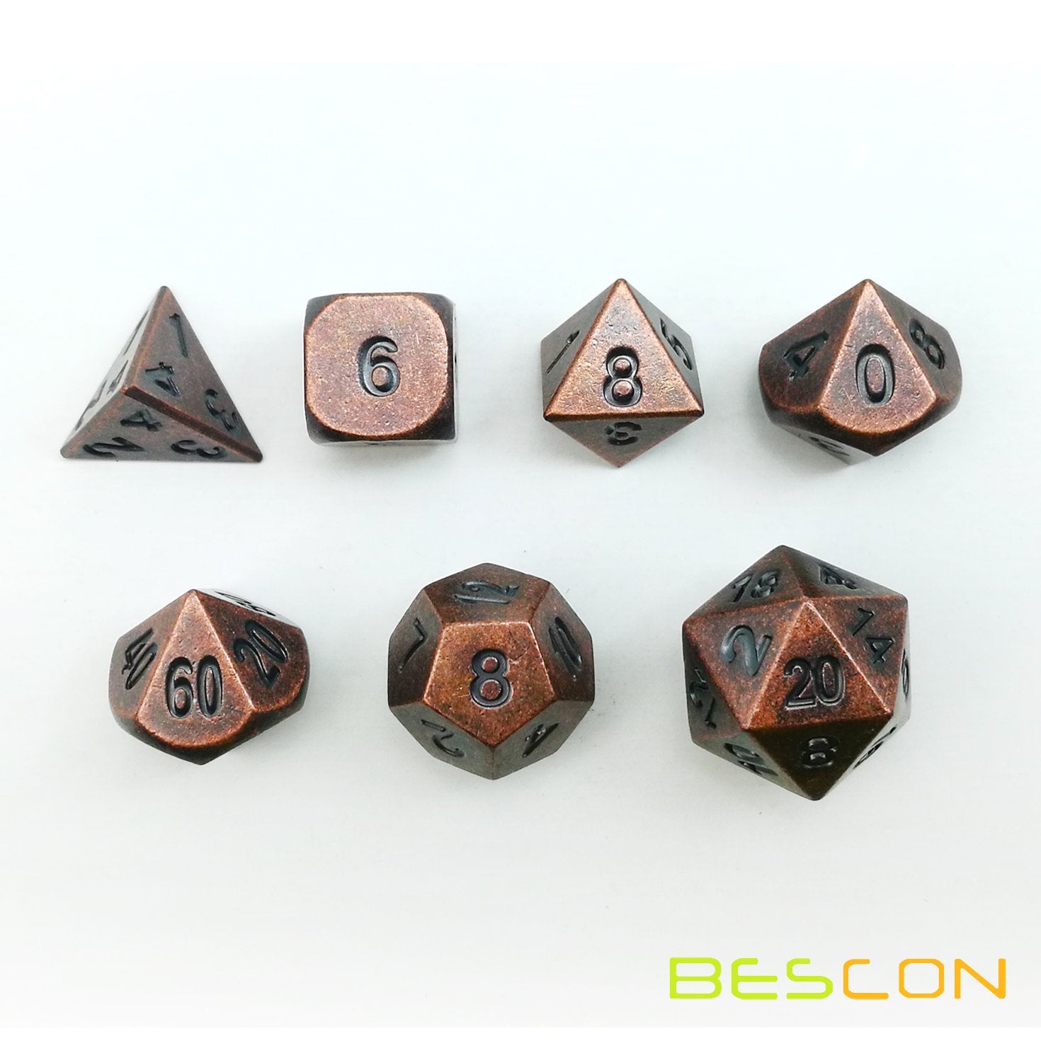 Bescon antique copper dice tucked in black velvet bag for safe transport.