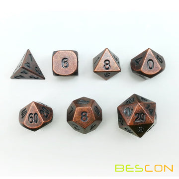 Bescon antique copper dice tucked in black velvet bag for safe transport.