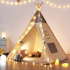 Besrey teepee tent for kids with lights creates a cozy indoor play space.