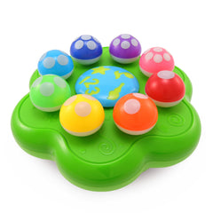 BEST LEARNING Mushroom Garden with light-up mushrooms guiding color and number recognition during play.