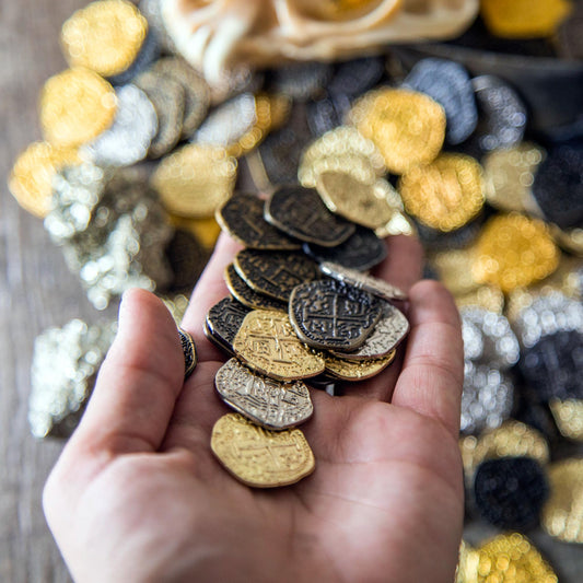 Beverly Oaks pirate coins silver doubloon closeup with dense feel for premium props.