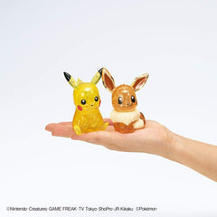 Beverly Pikachu Eevee crystal puzzle on display catching ambient light.