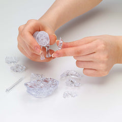 Beverly Transparent crystal piece detail catching light for a luminous effect.