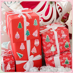 BeYumi pine tree stickers applied to gift wrap for festive decor.