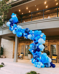 Bezente pastel blue balloons create soft contrast perfect for baby showers and birthdays.