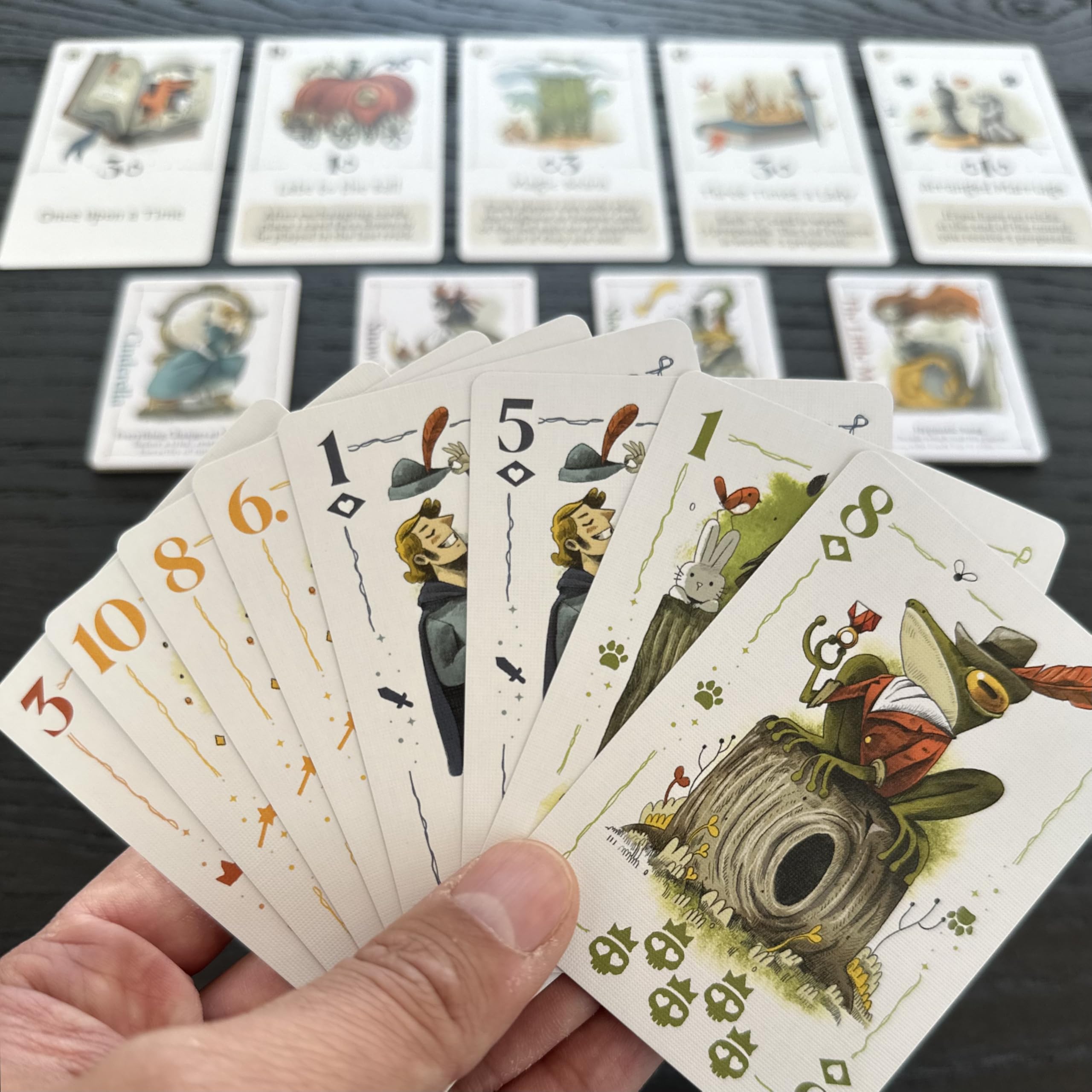 Bezier Games Rebel Princess Deluxe round rule image illustrates changing tricks and scoring moments