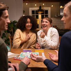 Family enjoying a cozy Bezzerwizzer Setup game night.