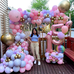 Biapian baby shower decor features a 6th birthday balloon.