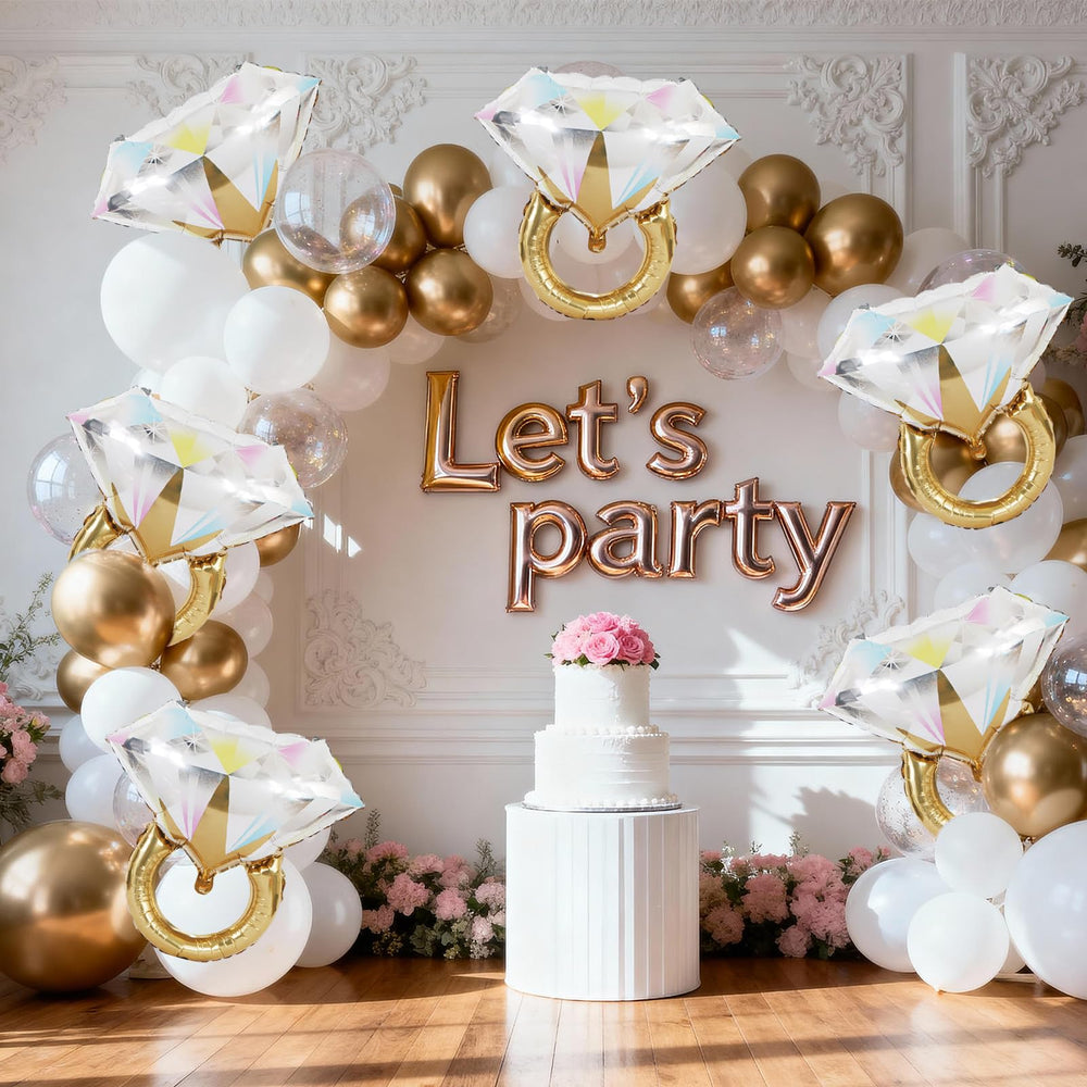 Biapian diamond ring balloons dessert table accent with sparkle.