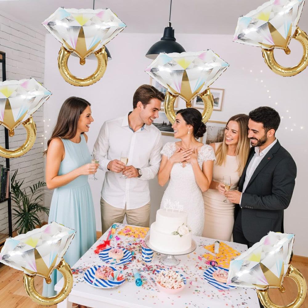 Biapian diamond ring balloons inflation process with straw and valve.